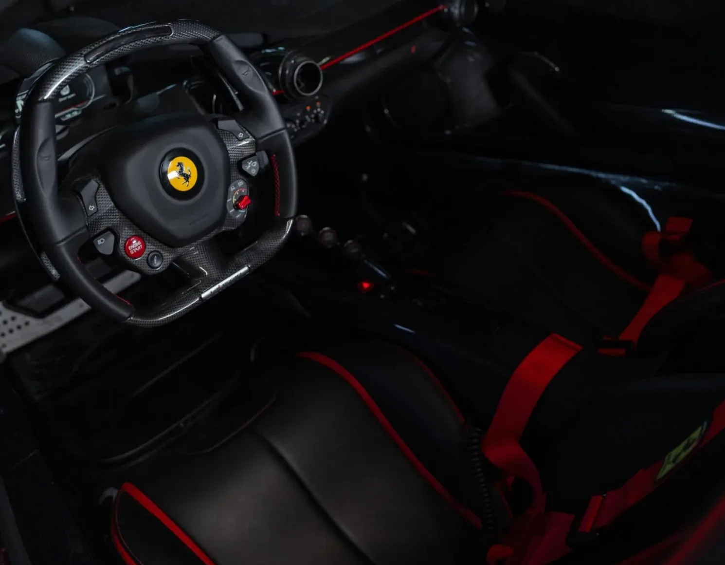 LaFerrari carbon-fibre cockpit with red racing harnesses